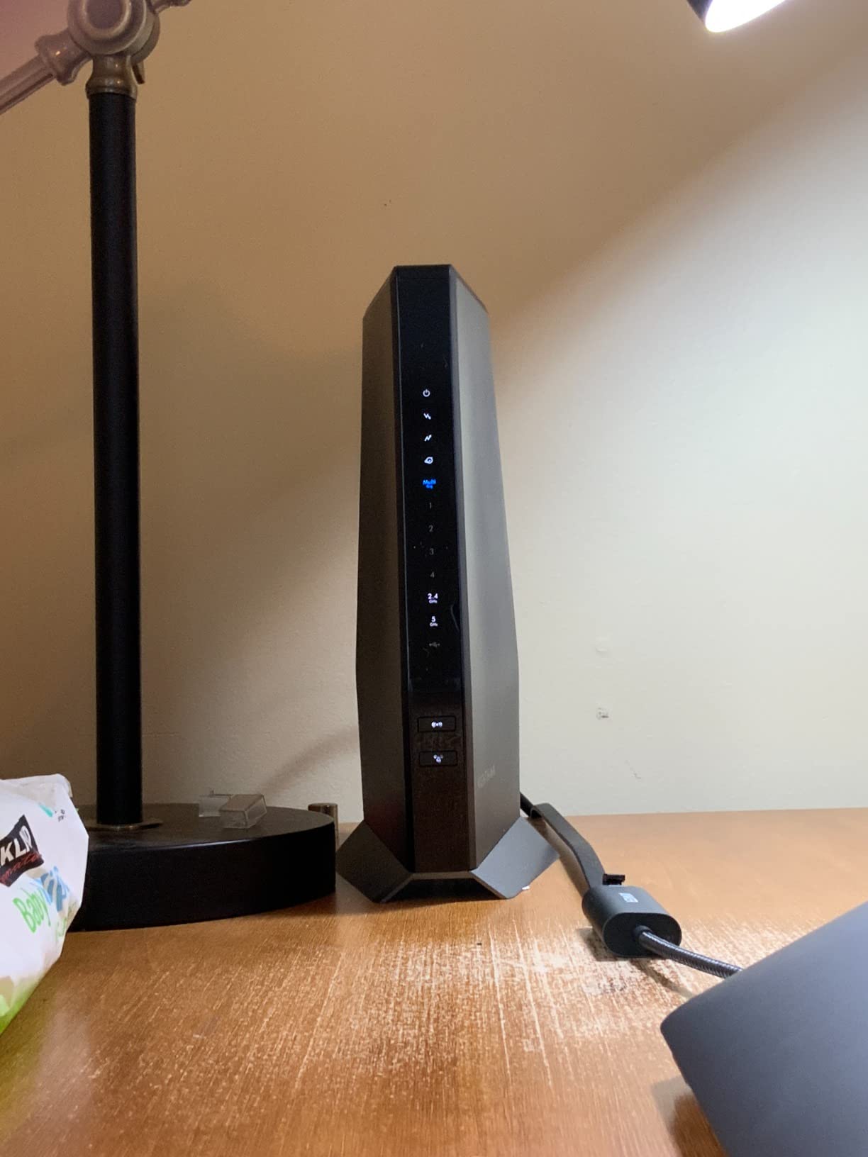 NETGEAR Nighthawk Cable Modem and WiFi 6 Router Combo (CAX80) - Compatible with All Major Cable Providers incl. Xfinity, Spectrum, Cox - Cable Plans up to 2 Gbps - AX6000 WiFi 6 Speed - DOCSIS 3.1 customer photo 1