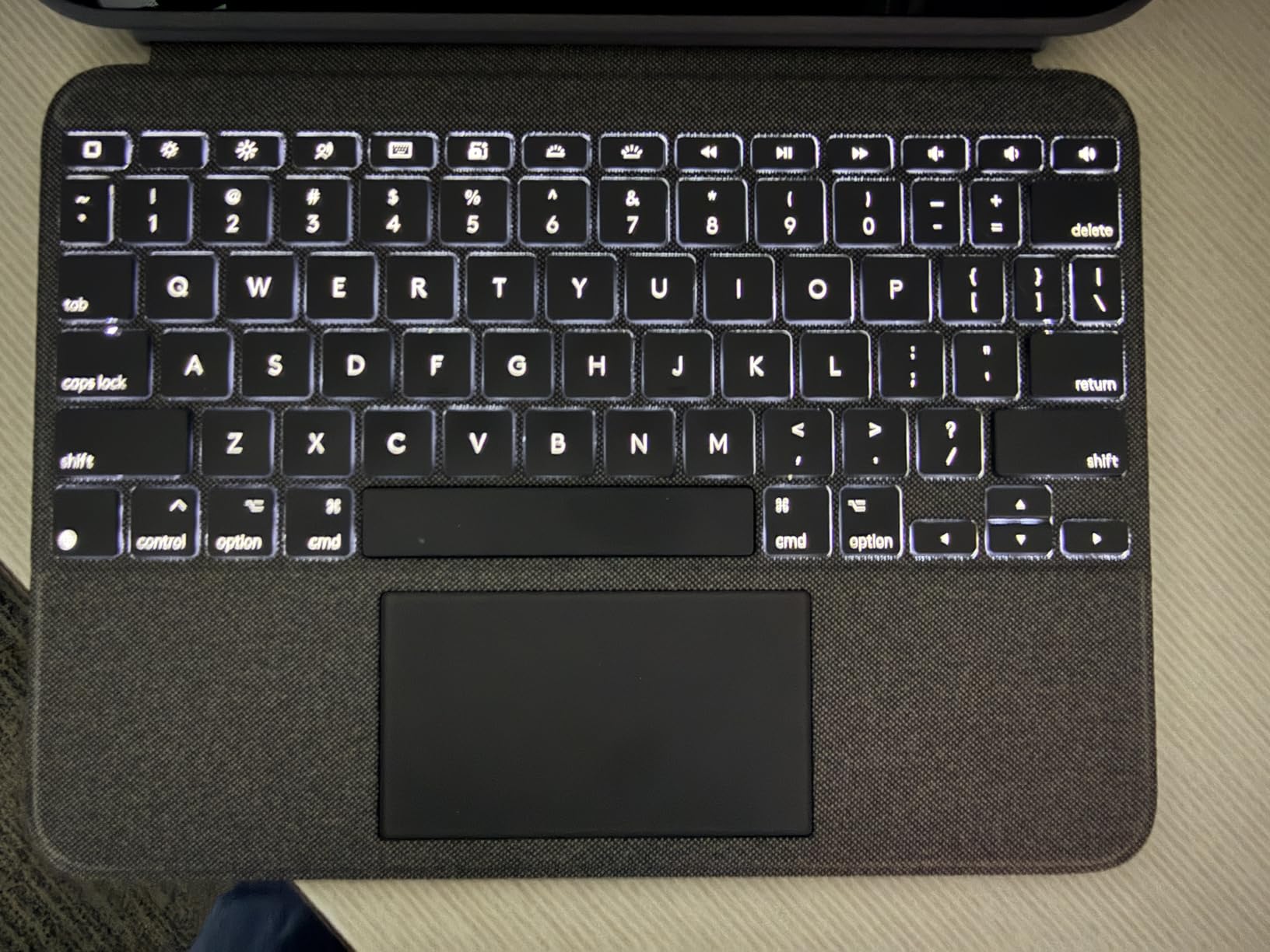 Logitech Combo Touch, Detachable iPad Keyboard Case (10th gen and A16) with Large Precision Trackpad, Full-Size Backlit Keyboard customer photo 1