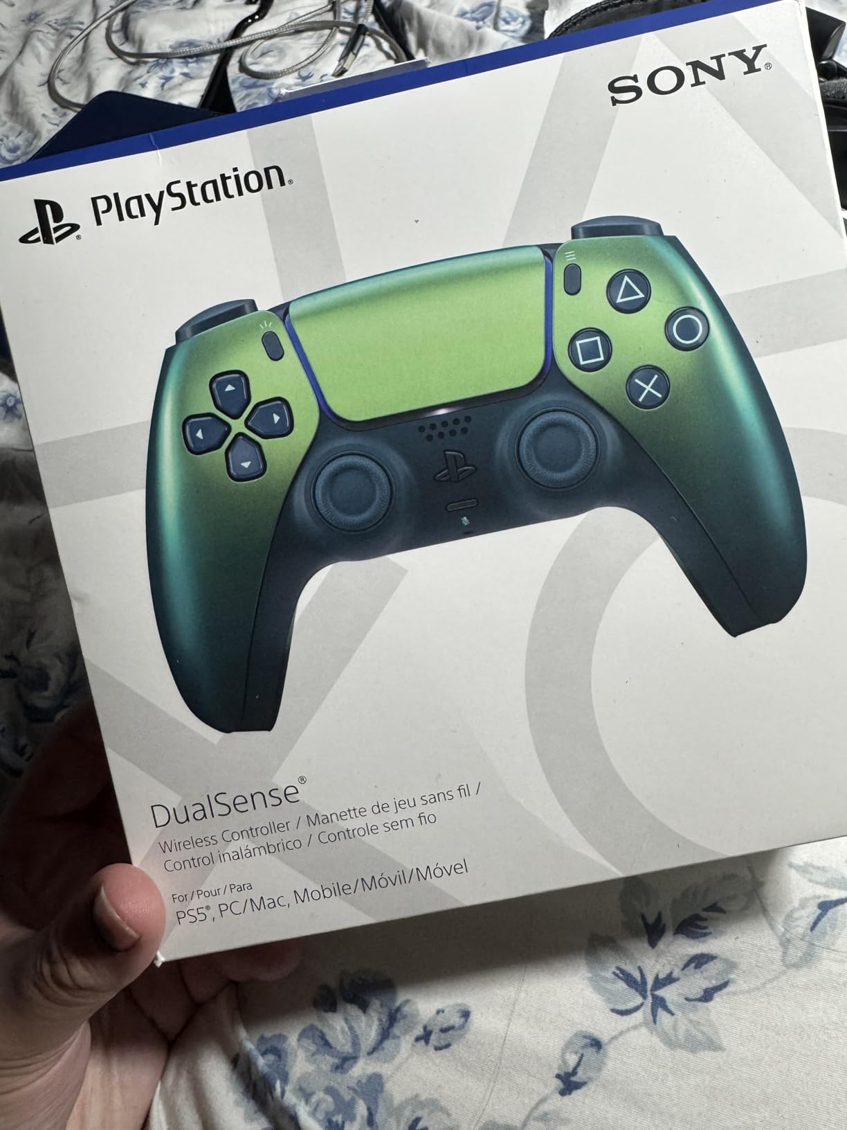 PlayStation DualSense Wireless Controller - Cosmic Red - for PS5, PC, MAC & Mobile customer photo 1