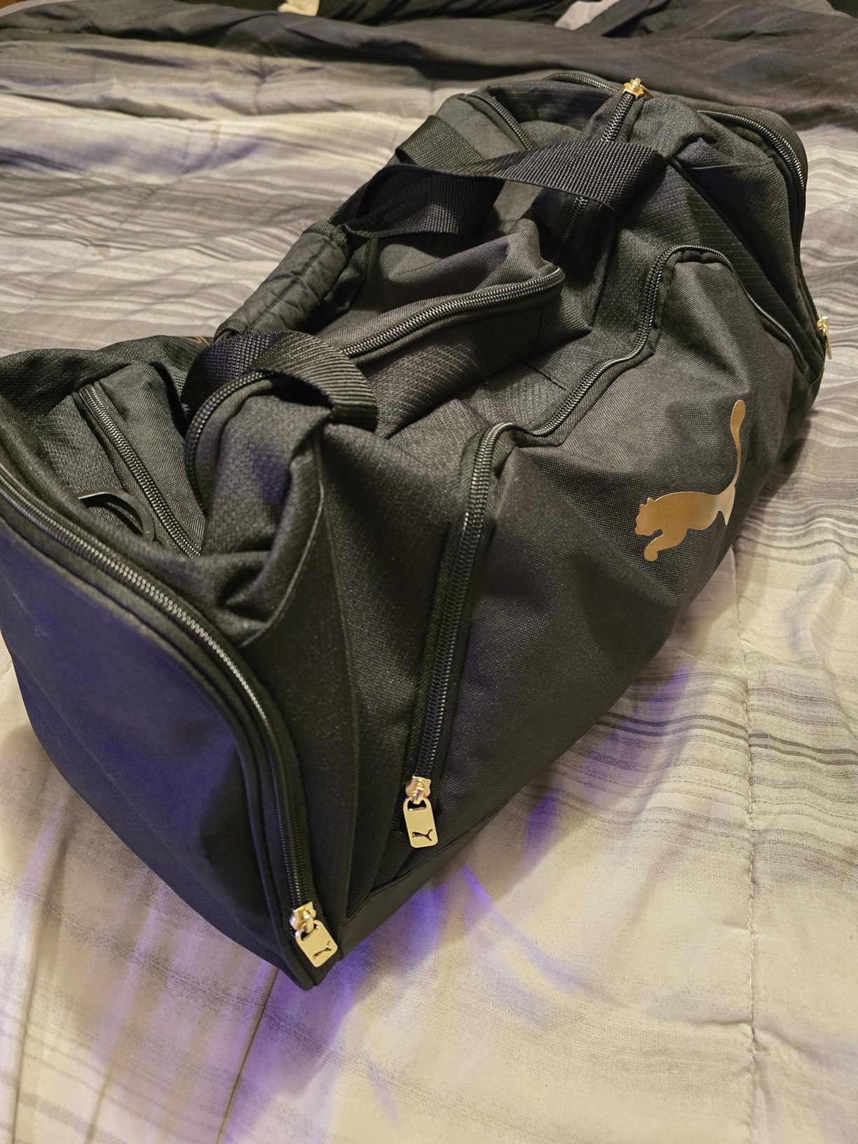 PUMA Accelerator Duffel Bag with Removable Strap & Shoe Pocket, Black/Gold, One Size customer photo 1