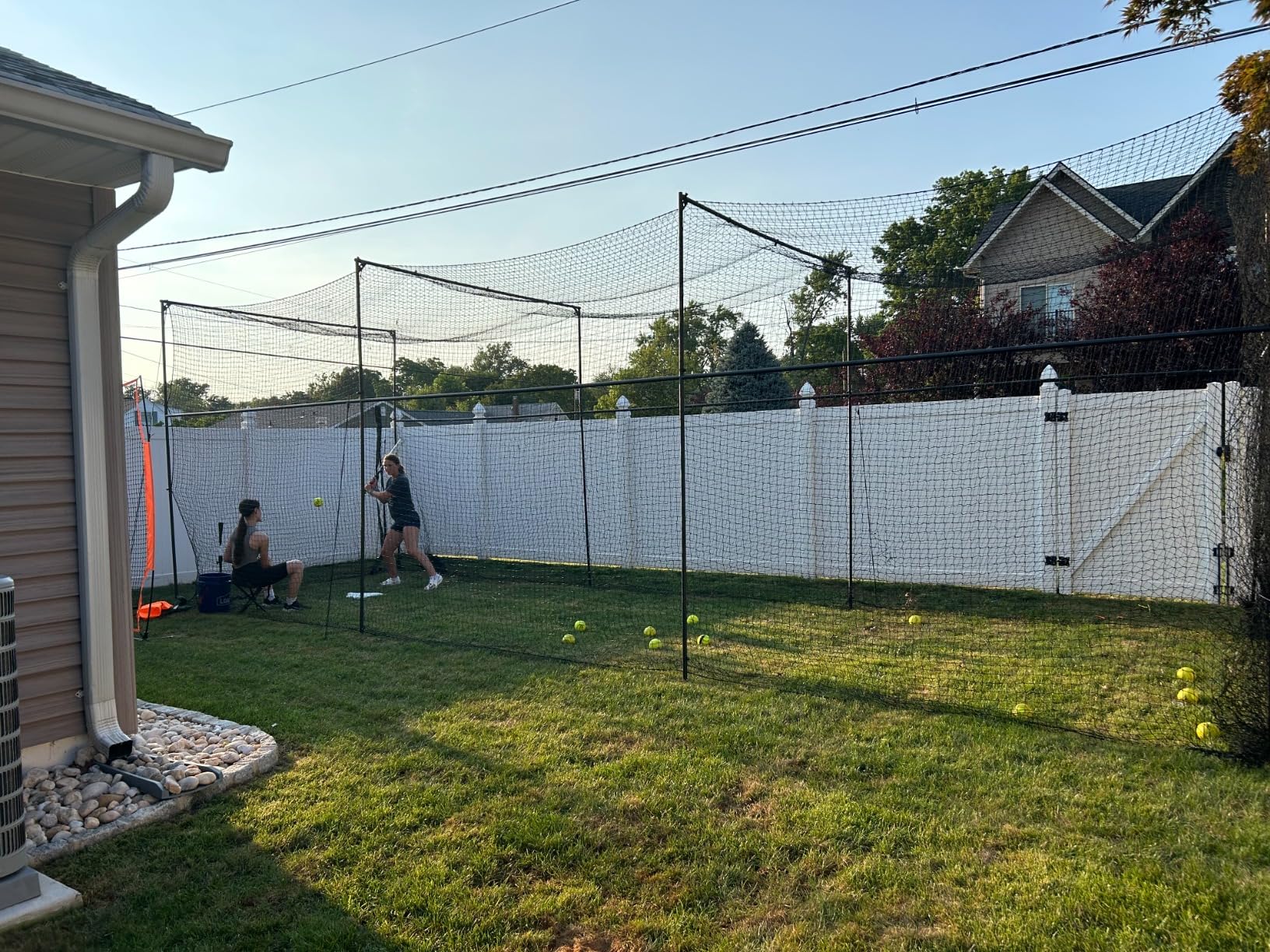 Murray Sporting Goods Baseball/Softball Batting Cage 40 ft - Black Steel Metal Frame with 60-Ply Net | Net Includes 7 ft Entrance Door and 4 ft Pitching Machine Hole customer photo 2