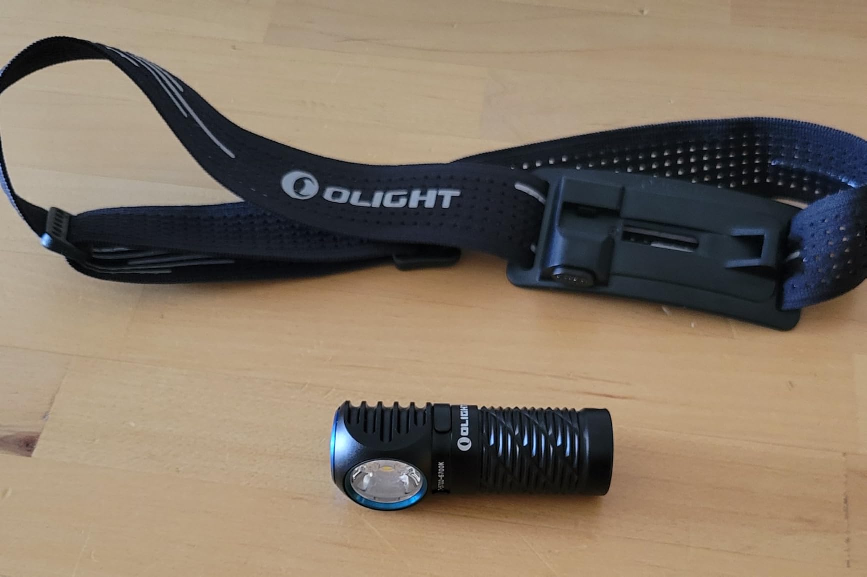 OLIGHT Perun 3 Mini Headlamp 1250 Lumens LED Head Flashlight, Rechargeable Headlight with Red Light Option, Perfect for Working, Hiking, Camping and Climbing customer photo 2