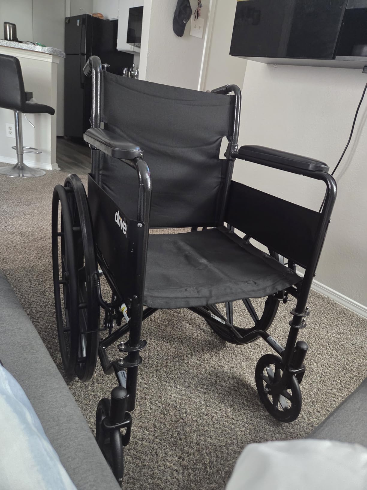 Drive Medical Silver Sport 1 Folding Transport Wheelchair, Black | Lightweight Folding Wheelchair Features Full Armrests and Removable Swing-Away Footrests for Easy Mobility customer photo 1