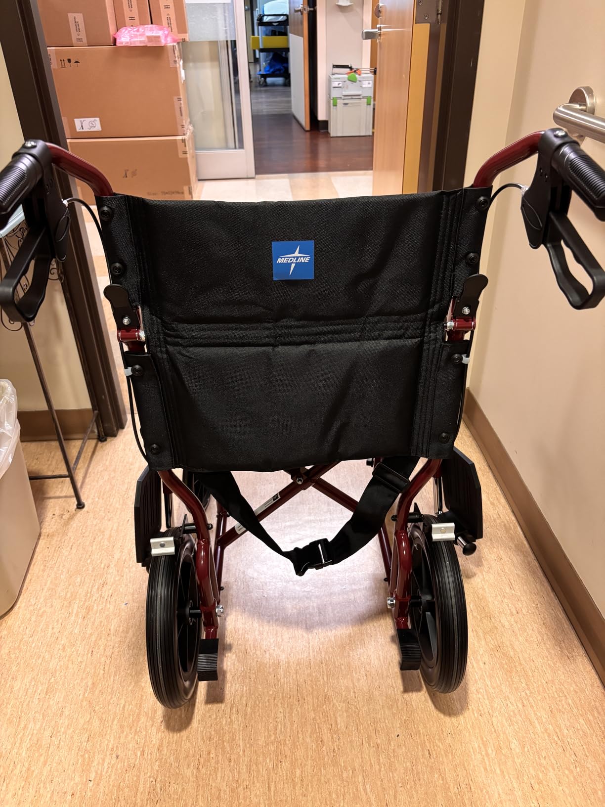 Medline Lightweight Foldable Transport Wheelchair with Handbrakes and 12-Inch Wheels, Red Frame, Black Upholstery customer photo 1