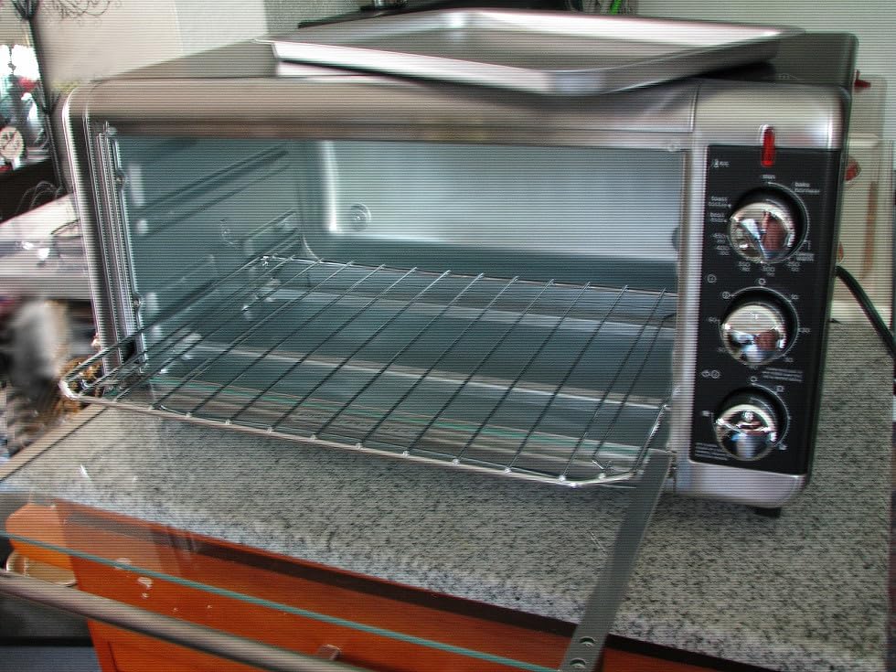 BLACK+DECKER TO3250XSBD 8-Slice Extra Wide Convection Countertop Toaster Oven, Includes Bake Pan, Broil Rack & Toasting Rack, Stainless Steel/Black | Extra-wide convection toaster oven fits 12-inch pizza with 60-minute timer and 3 rack positions customer photo 1