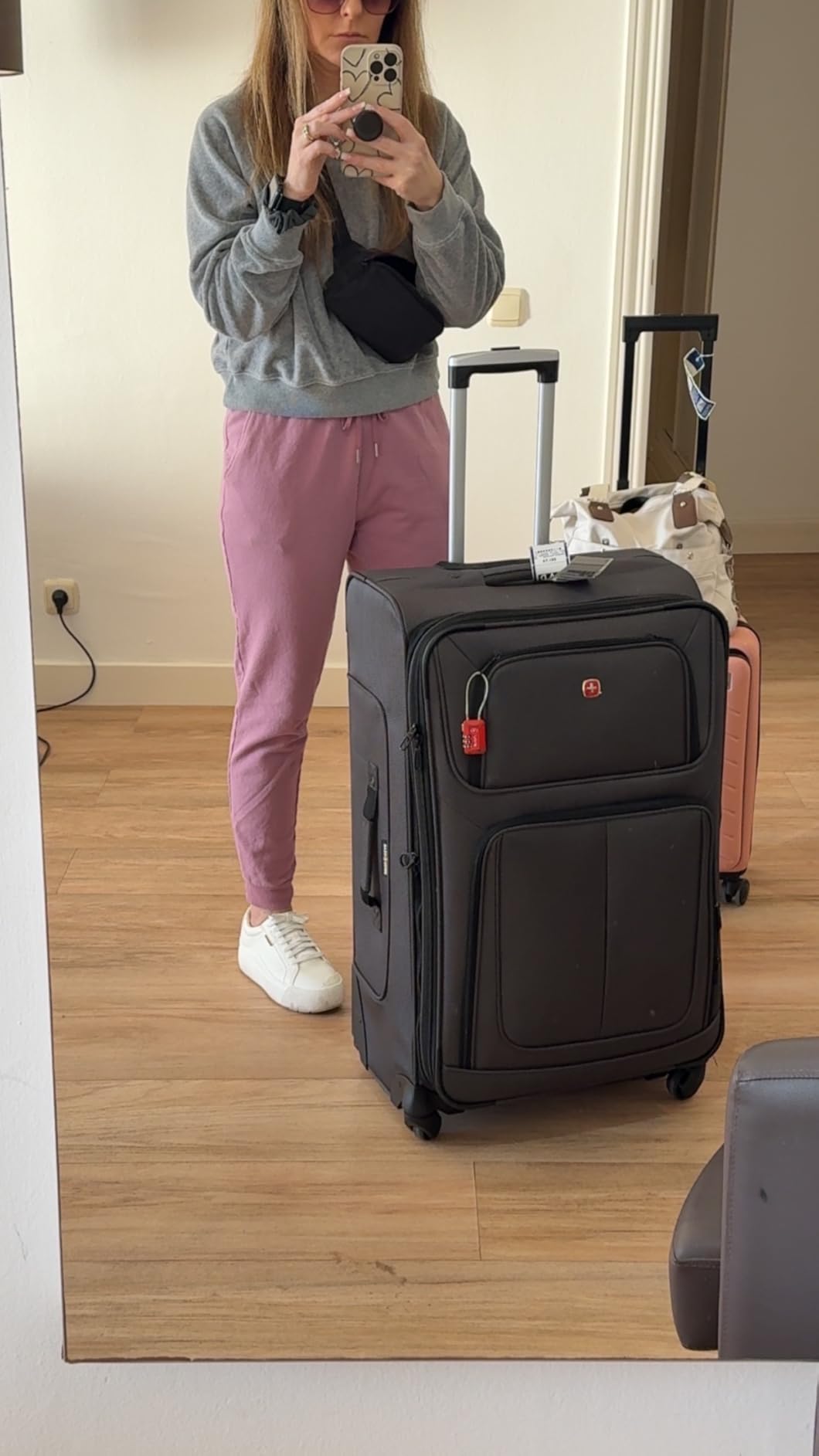 Sion Softside Expandable Spinner Luggage Durable Lightweight Travel Suitcase, Blue, Checked-Large customer photo 1