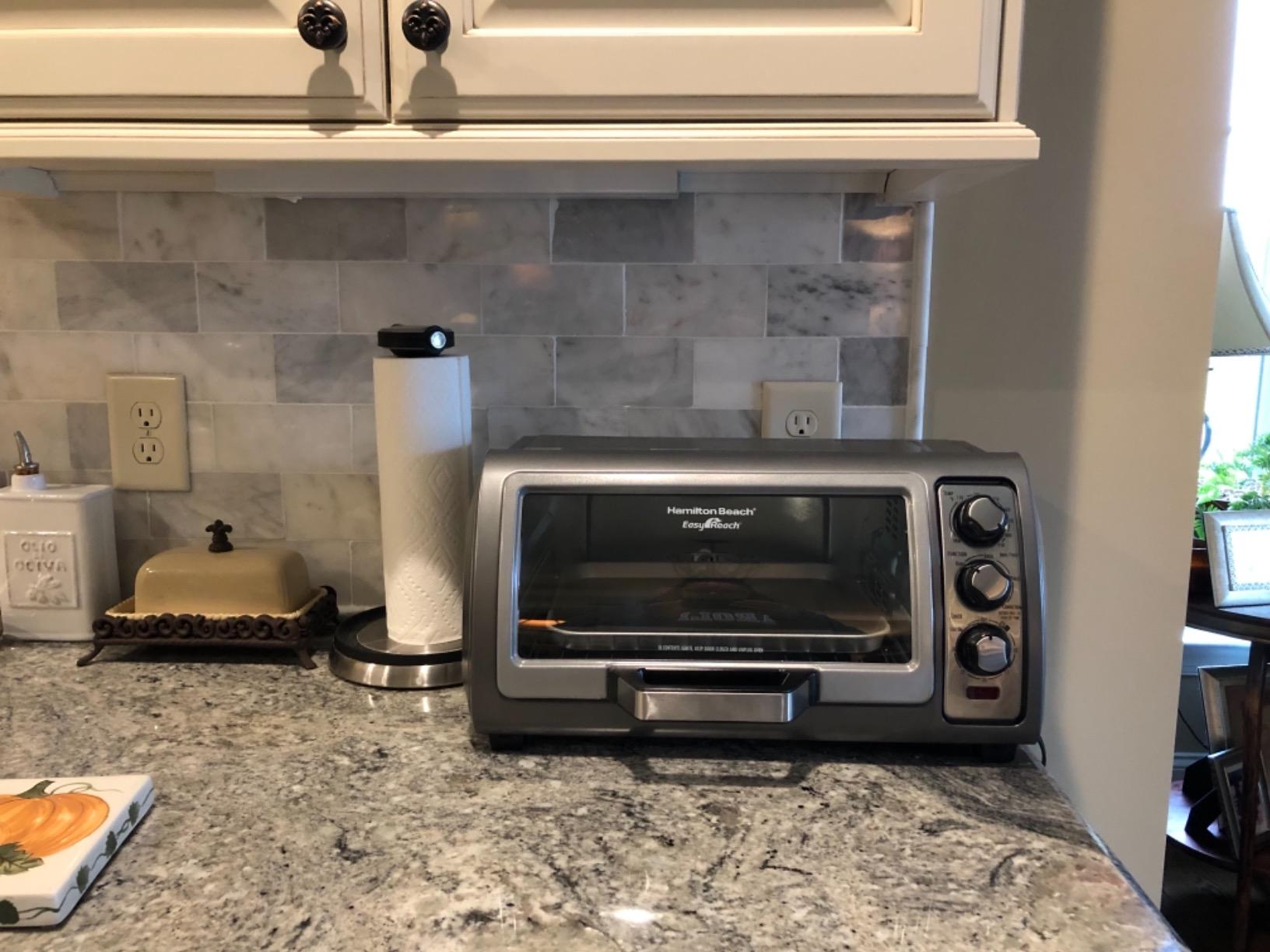 Hamilton Beach Easy Reach 6 Slice Countertop Convection Toaster Oven | Roll-Top Door For Easy Access | Bake, Broil & Toast Functions | 150 to 450ºF Adjustable Temp | Auto Shutoff | Silver customer photo 1
