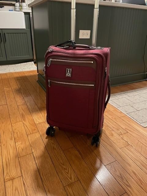 Travelpro Platinum Elite Checked Luggage Spinner, Red, 25-Inch customer photo 1