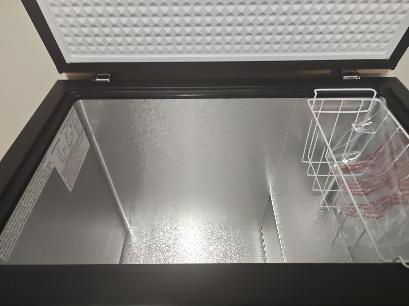 FRIGIDAIRE Chest Deep Freezer, 7 Cu. Ft, Black Adjustable Thermostat-Removable Vinyl Coated Wire Basket-Easy Defrost Drain, Eye-Catching Stainless Steel Top Door- Garage Ready customer photo 2