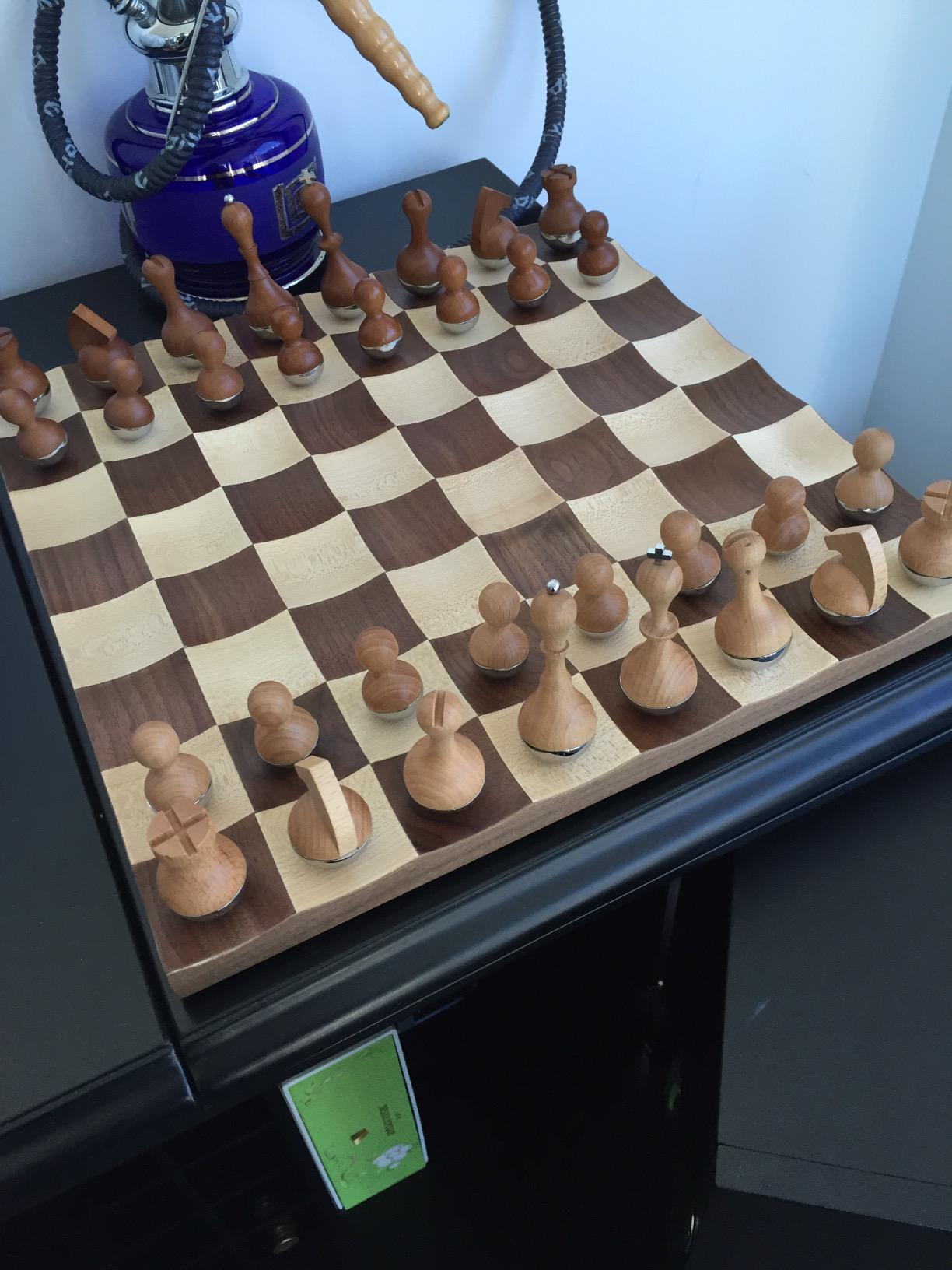 Umbra Wobble Chess Set, Walnut and Maple Wood Board, 15x15-Inch, Walnut | Chrome plated details, weighted playing pieces, interactive concave design customer photo 1