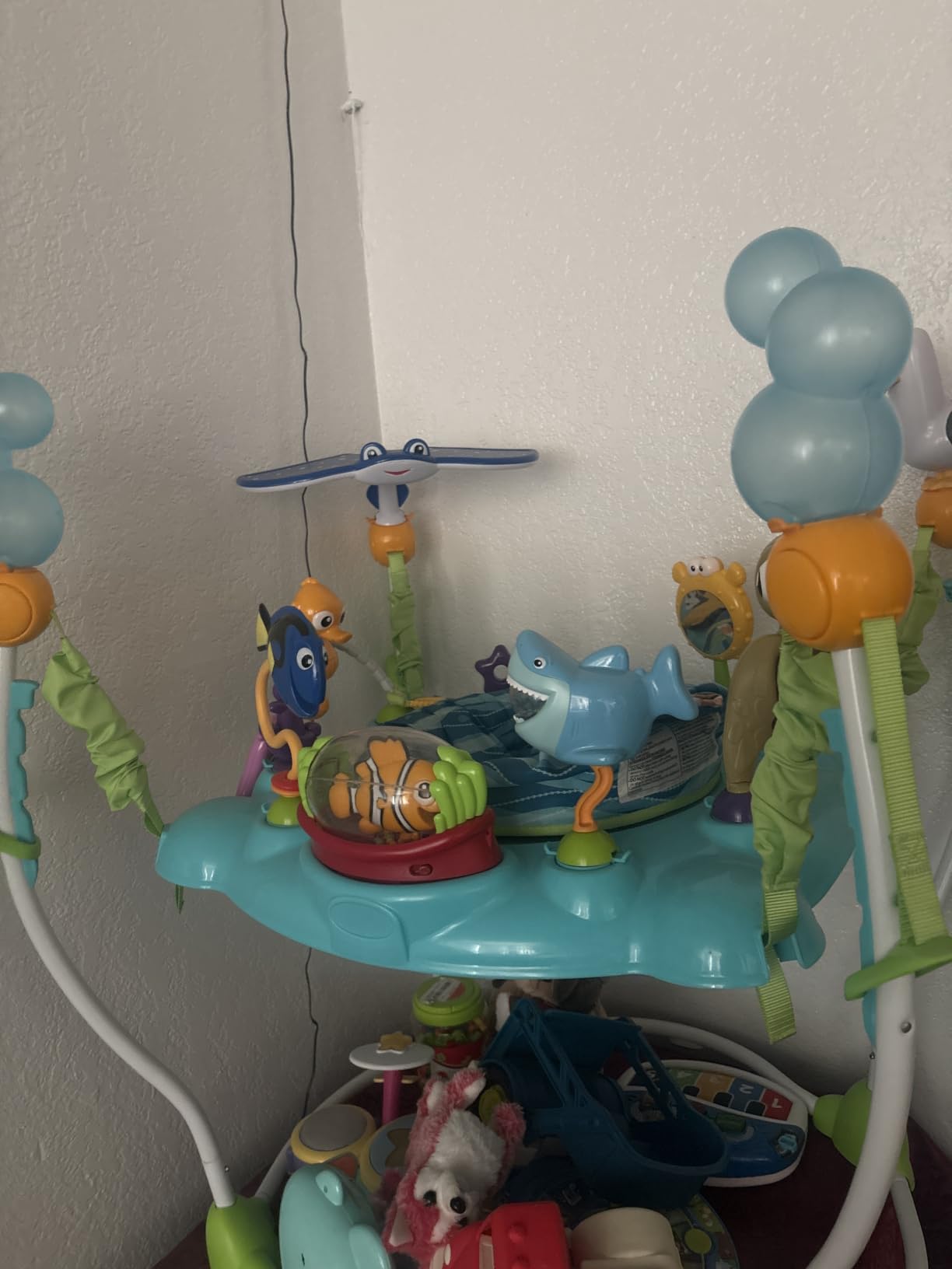 Bright Starts Disney Baby Finding Nemo Sea of Activities Baby Activity Center Jumper with Interactive Toys, Lights, Songs & Sounds, 6-12 Months (Blue) customer photo 1