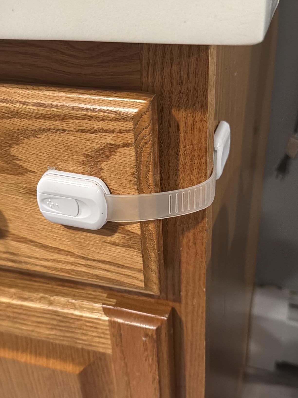 Child Safety Strap Locks (10 Pack) Baby Locks for Cabinets and Drawers, Toilet, Fridge & More. 3M Adhesive Pads. Easy Installation, No Drilling Required, White customer photo 1