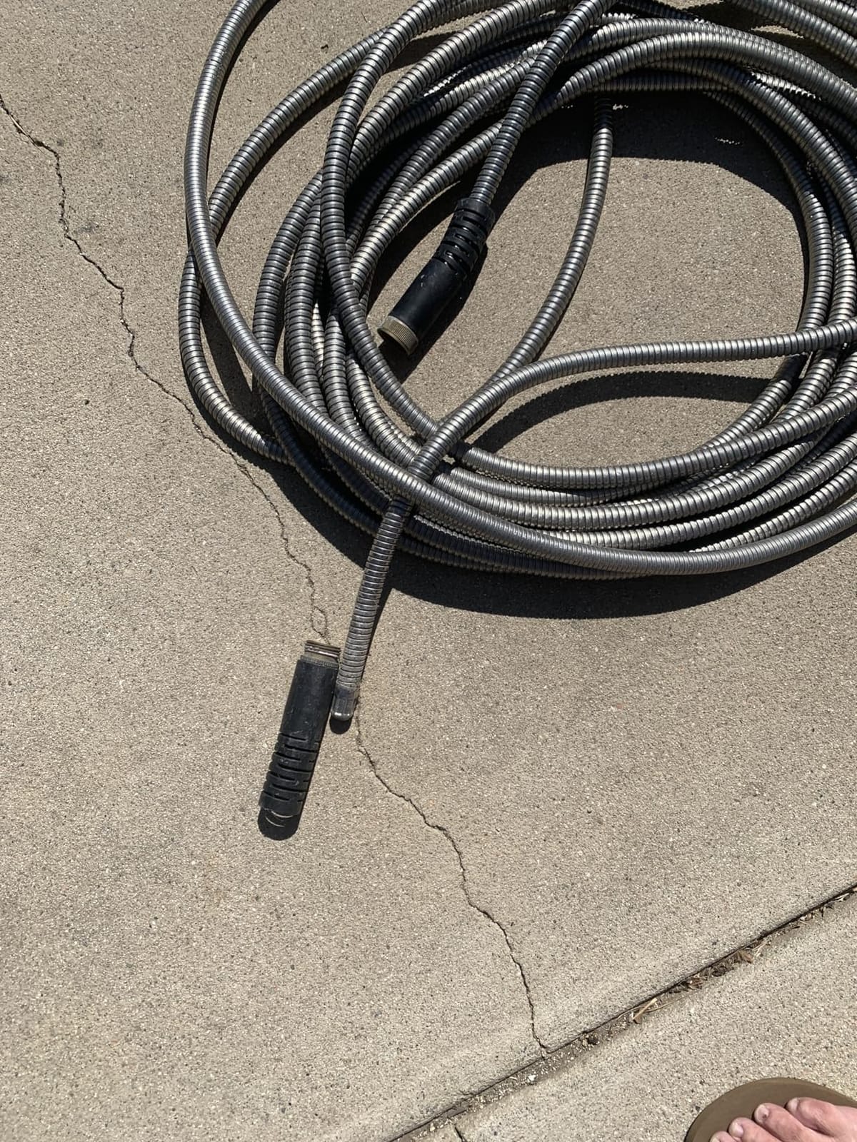TITAN Garden Hose 100FT - 304 Stainless Steel Metal Water Hose, Flexible, Kink-Free, Lightweight, Durable, Crush Resistant Fittings, Easy to Coil, 500 PSI customer photo 1