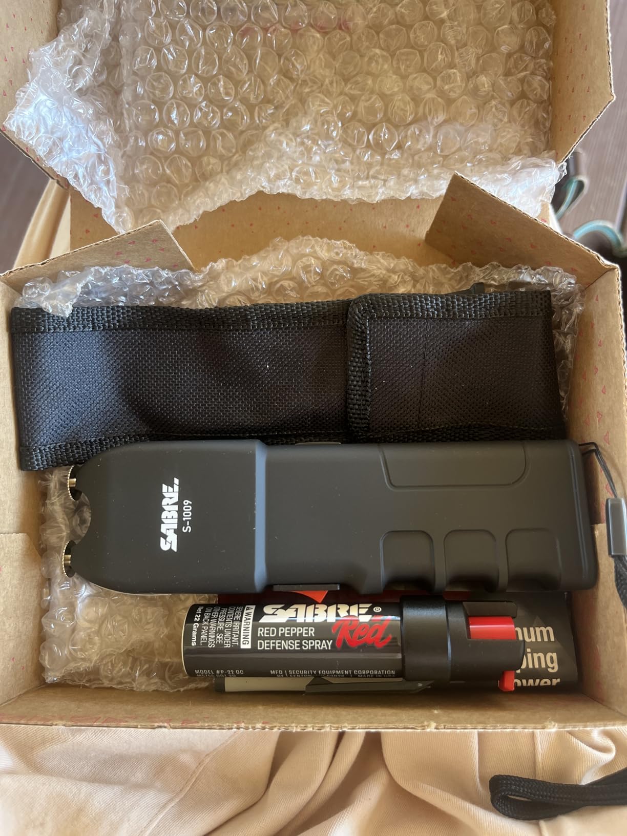 SABRE Pepper Spray & 3-in-1 Stun Gun with Flashlight and Anti-Grab Bar Technology, Self Defense Kit, 35 Bursts, 10 Ft (3 m) Range, 120 Lumens LED Light, Rechargeable Battery (Set of 2) customer photo 1