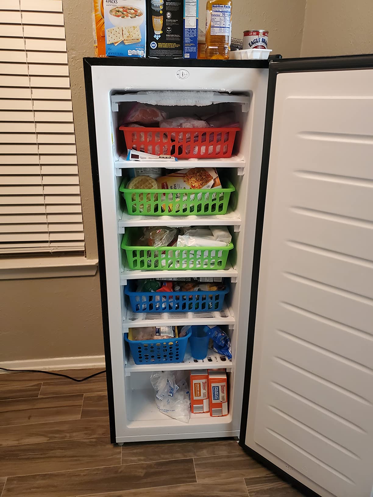Frigidaire Upright Freezer, 6.5 cu. ft., Deep Freeze, Vinyl Coated Metal with Wire Shelving, Compact for Kitchen, RV, Dorm, Cabin, and Trailer, Platinum Design Series, Silver - 21D x 23W x 56H customer photo 1