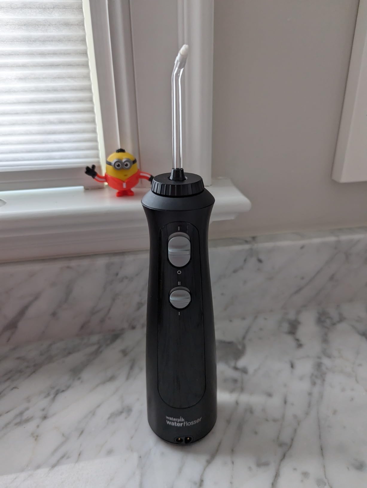 Waterpik Cordless Pearl Portable Water Flosser, Rechargeable, White customer photo 1