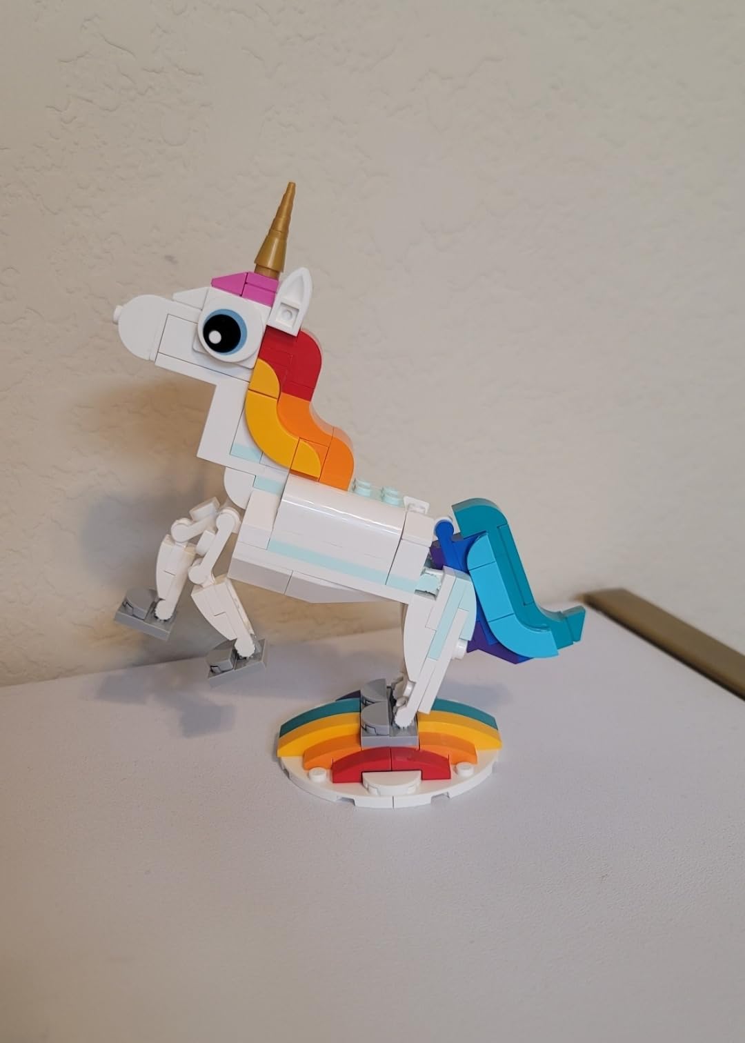 LEGO Creator 3 in 1 Magical Unicorn Toy, Transforms to Seahorse to Peacock, Rainbow Animal Figures, Unicorn Gift for Grandchildren, Girls and Boys, Buildable Toys, 31140 customer photo 1