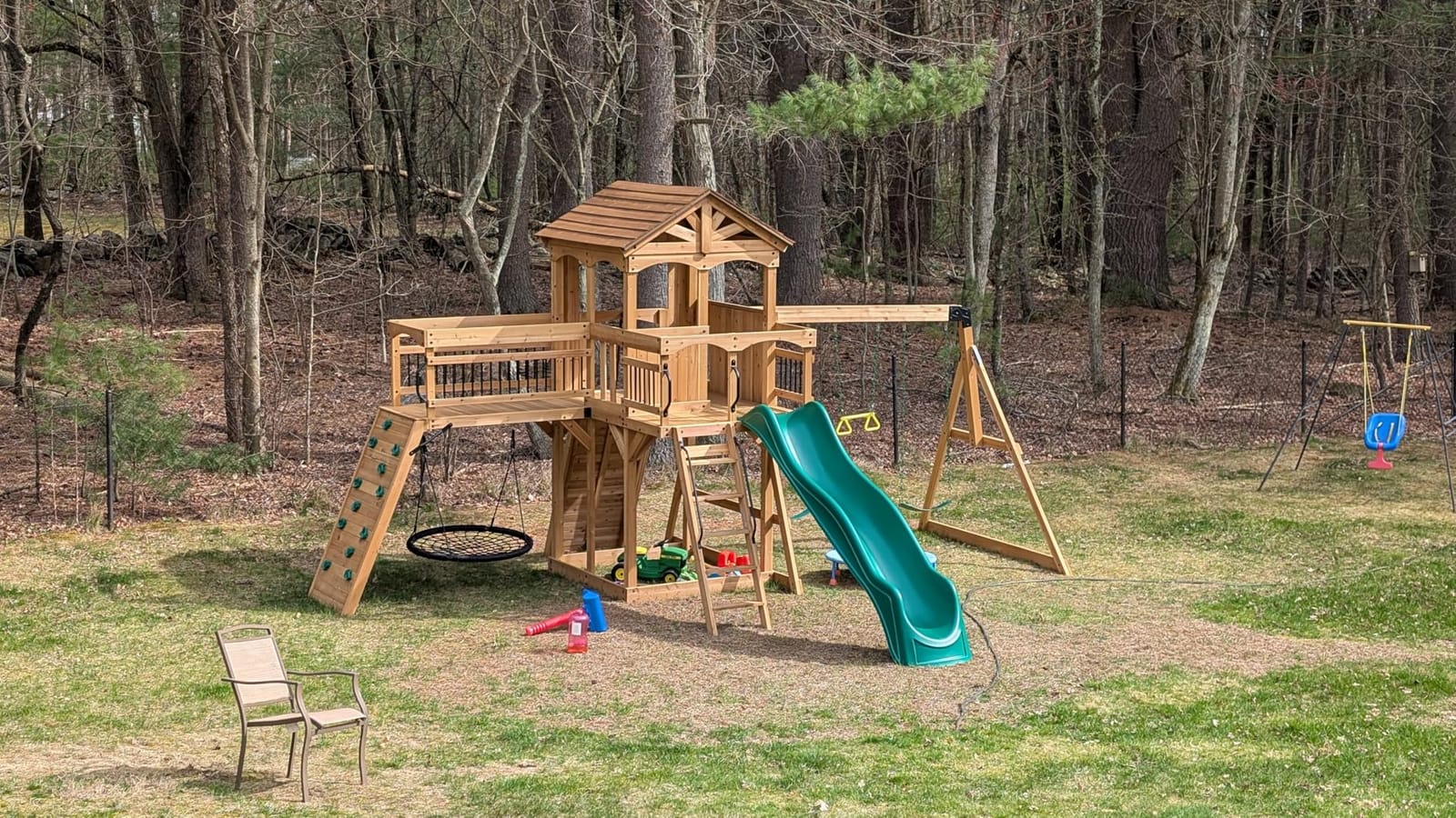 Backyard Discovery Sterling Point Cedar Wood Swing Set with Wave Slide, Raised Clubhouse, Wooden Bridge, Rock Wall, Belt Swings, Web Swing, Trapeze, Balcony, Climbing Wall, Ladder, Outdoor Playset customer photo 2