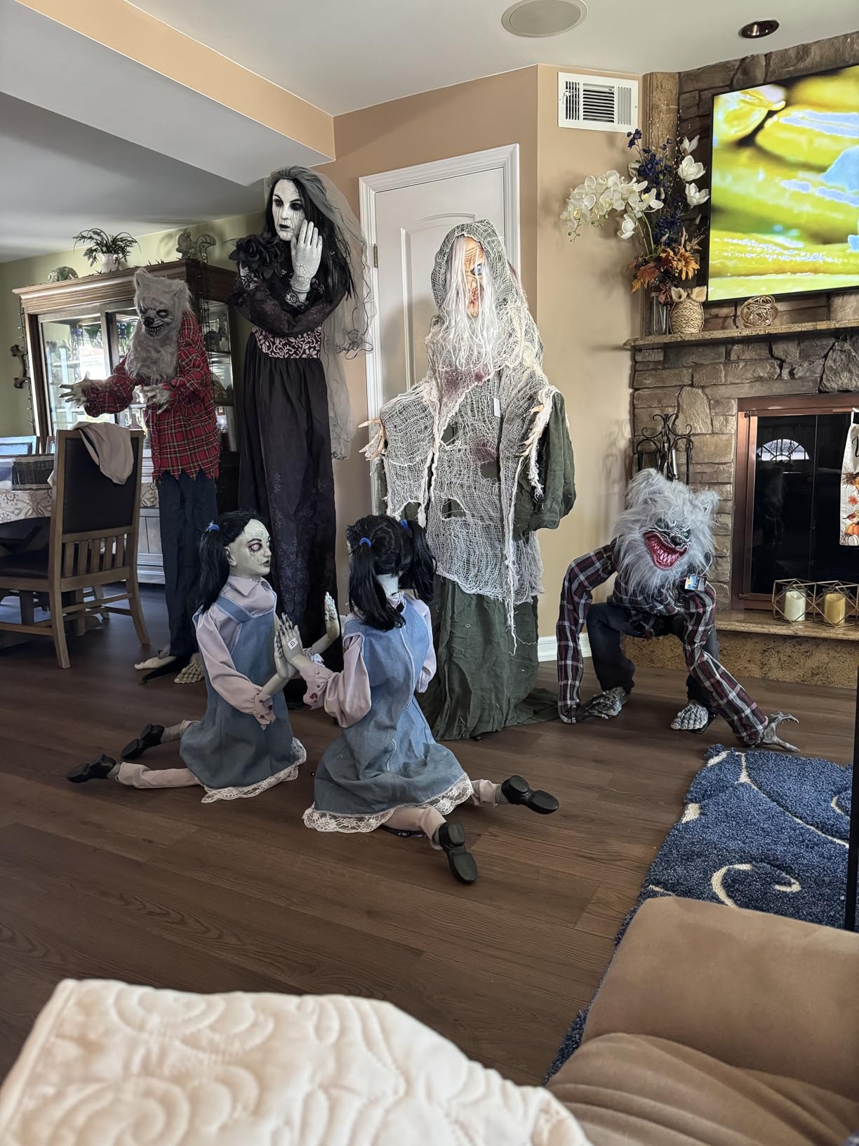 JOYIN Halloween Animatronics Clown Holding Doll, Life Size Halloween Decoration Outdoor with Motion & Sound & Light, IR Sensor Activated Animated Decor for Party Supplies Haunted House Yard Lawn customer photo 1