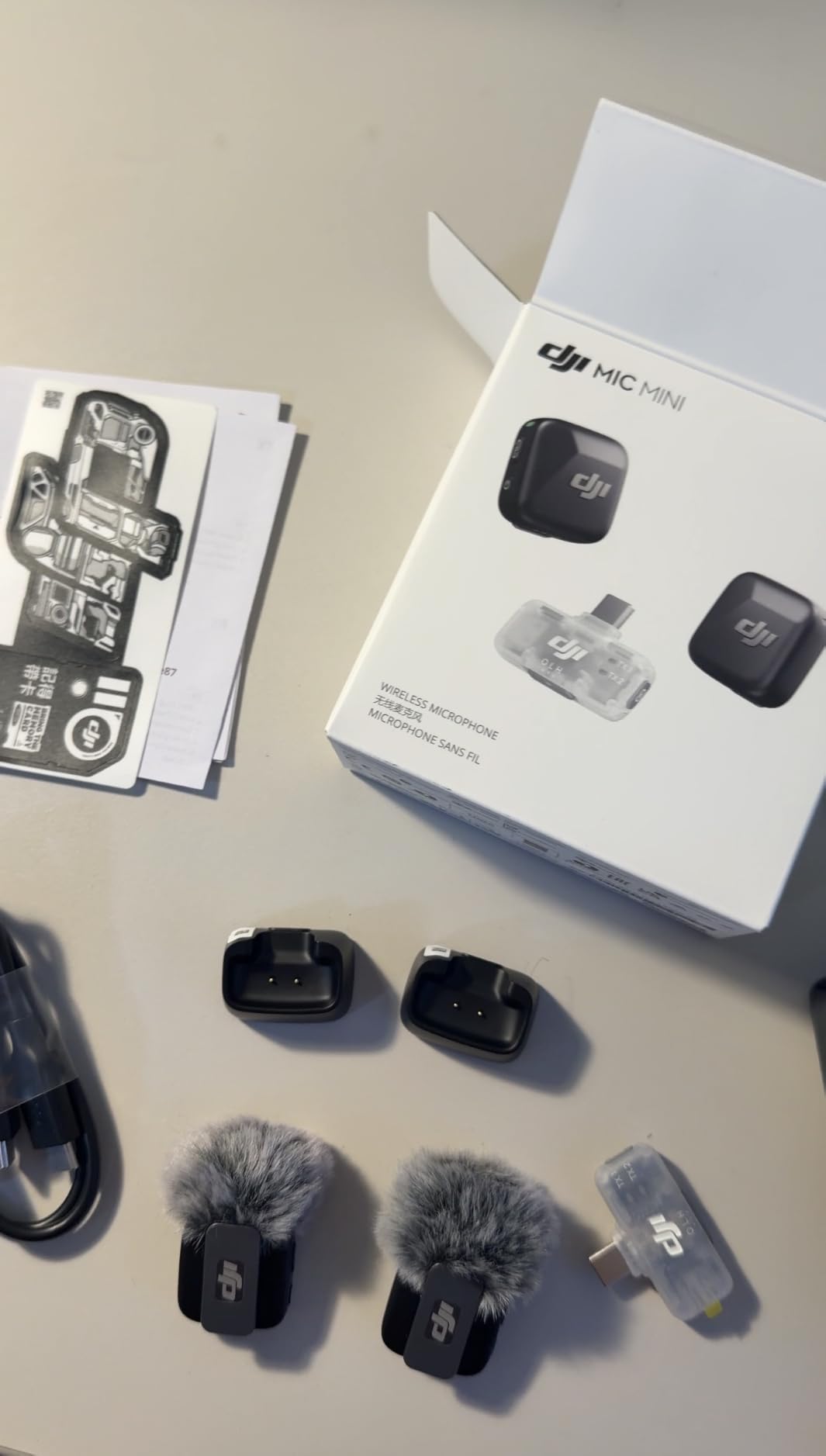 DJI Mic Mini (2 TX + 1 RX + Charging Case), Ultralight, Detail-Rich Audio | 48h Use, Noise Cancelling, Automatic Limiting, Wireless Microphone for Camera/iPhone/Android, Vlog, Streaming customer photo 2