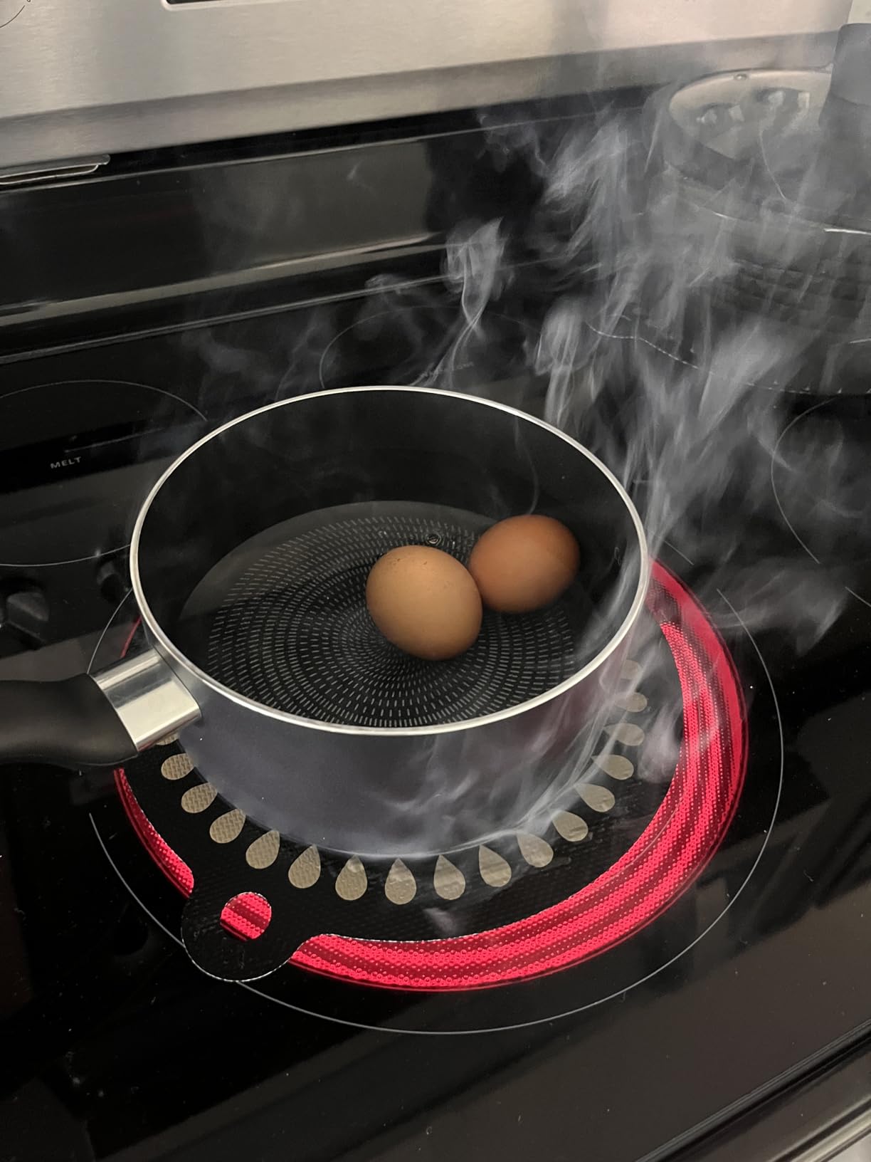 9.5 Inch Thermochromic Silicone Induction Cooktop Protect Mat, 2Pcs Induction Cooktop Protective Cover, Non-Slip Pads to Prevent Pots and Pans from Sliding While Cooking customer photo 2