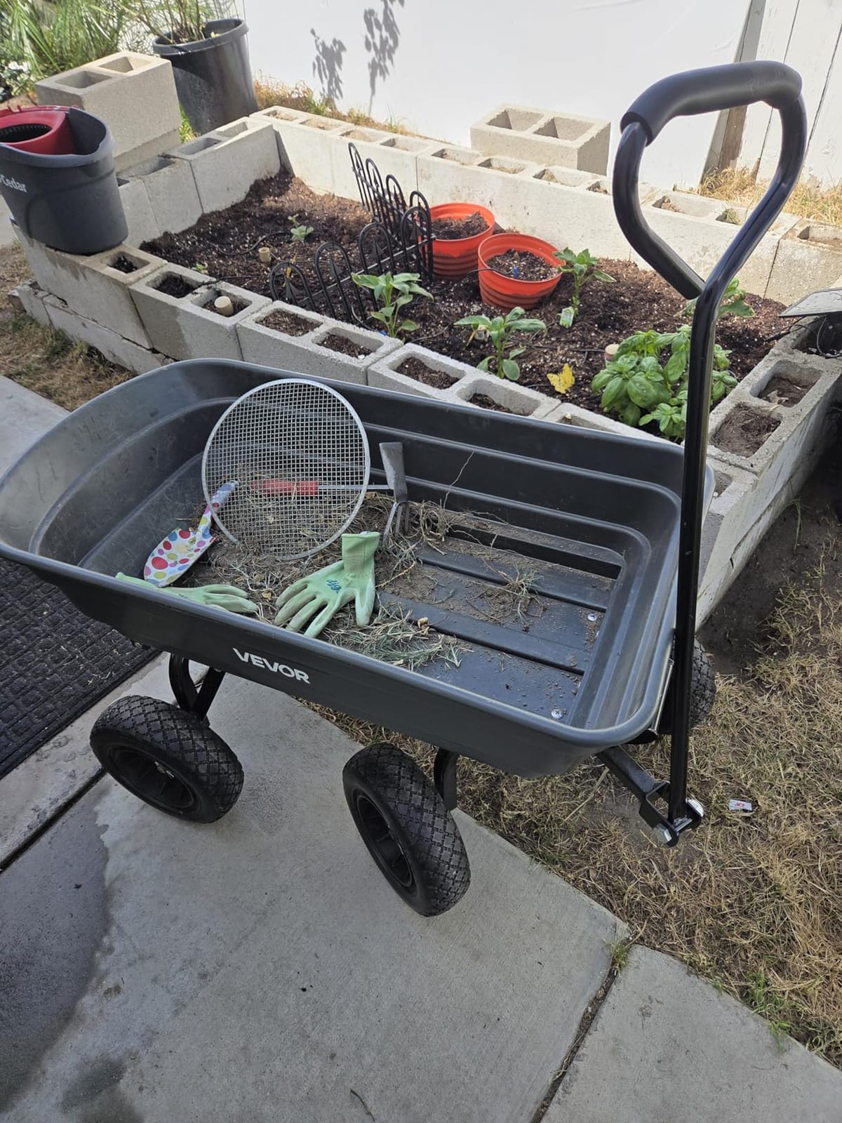 VEVOR 800lbs Poly Dump Garden Cart, Heavy Duty Yard Dump Cart Wagon, 4 Wheel Wheelbarrow with 10in Tires, 180°Rotating Handle, Steel Frame and Quick Release System customer photo 2
