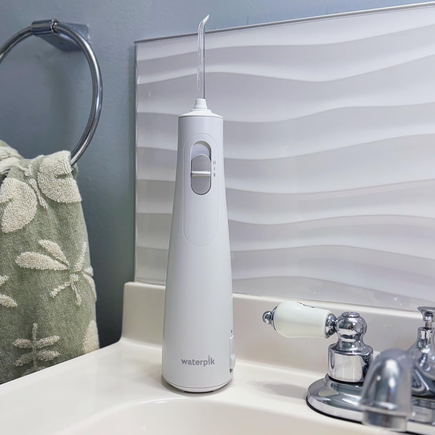 Waterpik Cordless 1100 Rechargeable Portable Water Flosser for Teeth Cleaning and Flossing, Travel, Braces Care, Healthier Gums, Waterproof for Shower, ADA Accepted, WF-30CD White, Packaging May Vary customer photo 2