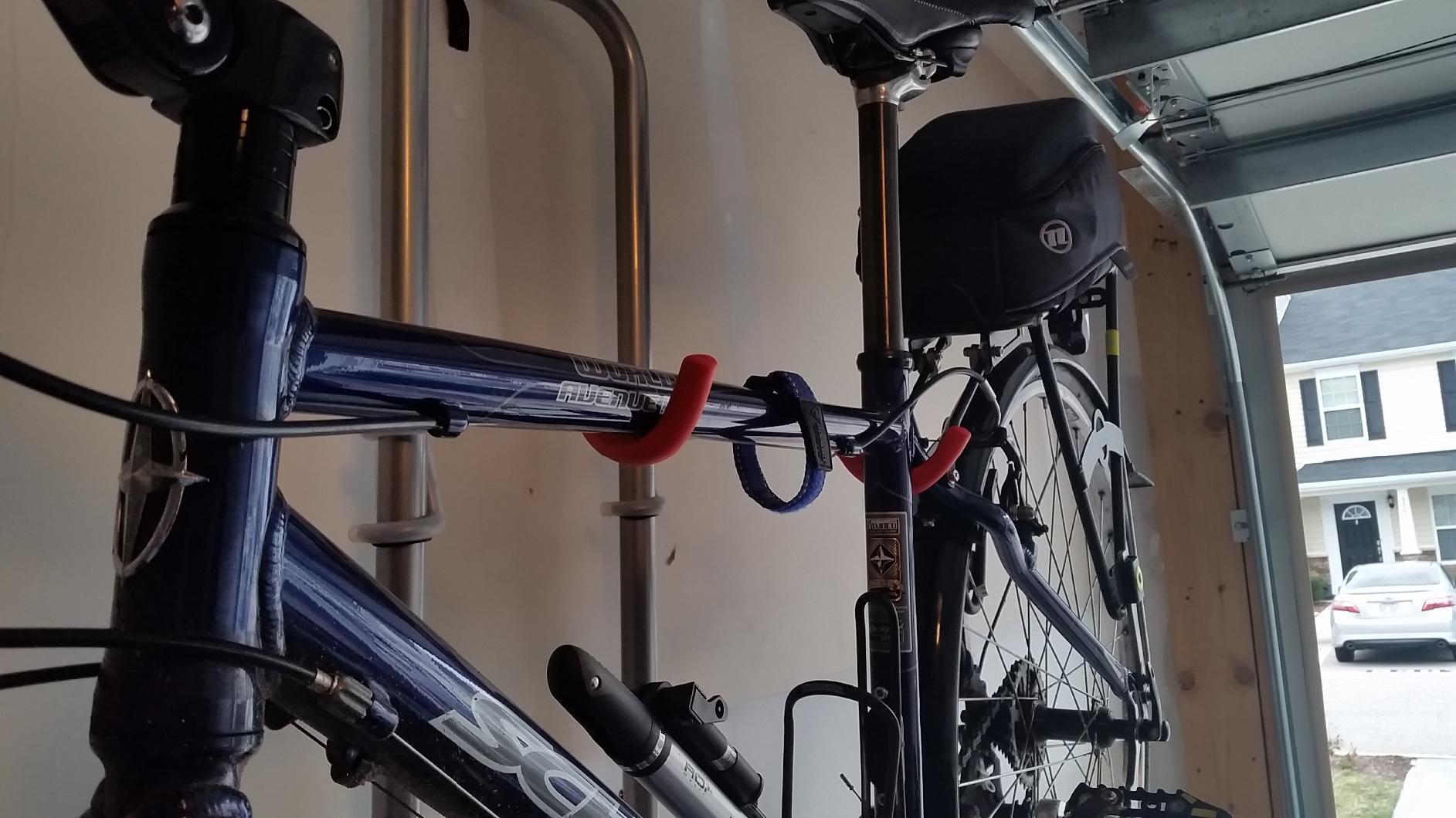 Delta Wall Ride Bike Rack Wall Mount with Tire Wall Guard Cycle - Vertical Bike Mount Holds Up to 100 lbs - Fully Adjustable Vertical Hanger Hook Design Provides Easy Bicycle Storage Access customer photo 1