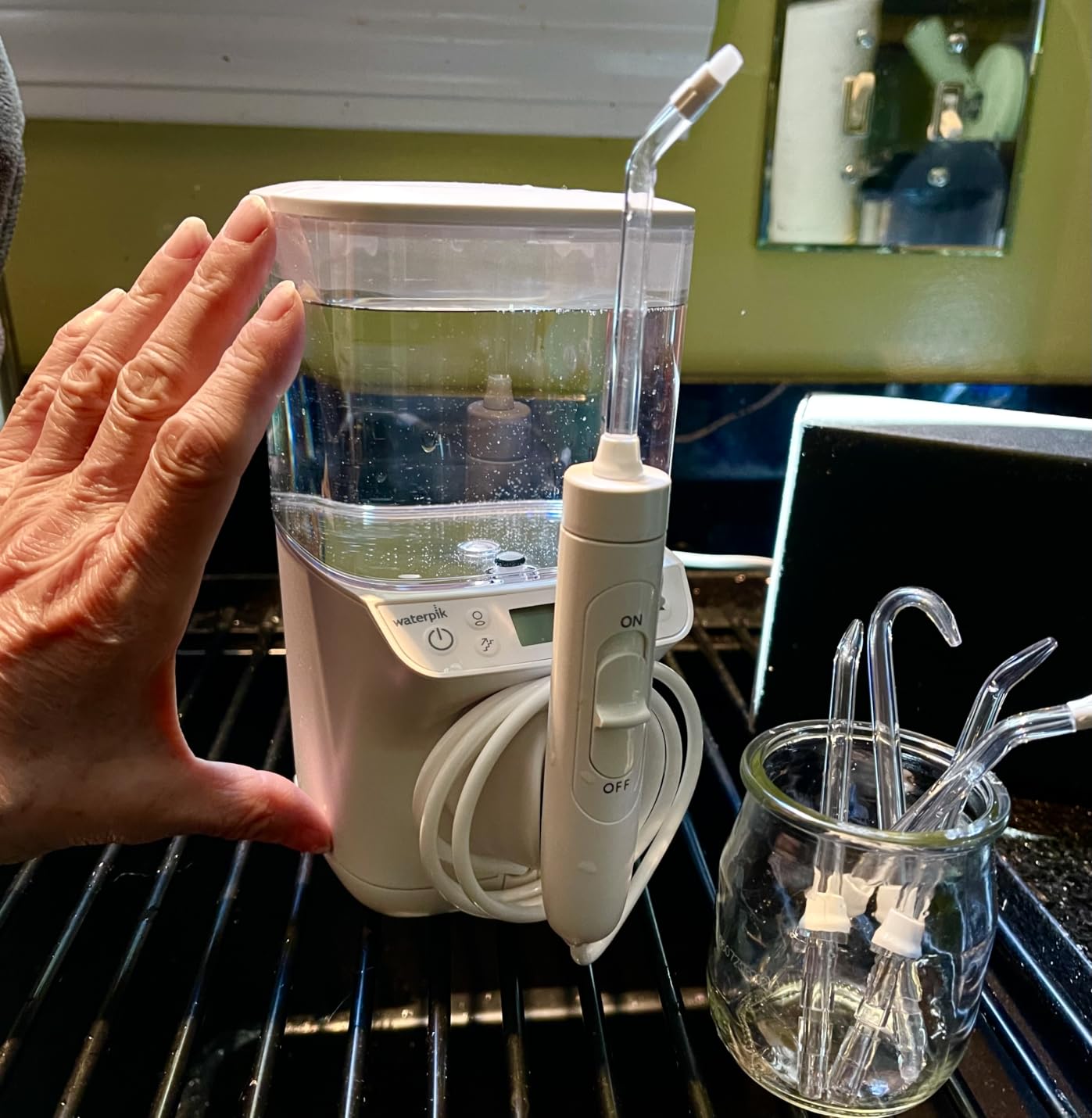 Waterpik Promax Countertop Water Flosser, SmartAdvance, 10 Settings, 5 Tips customer photo 2