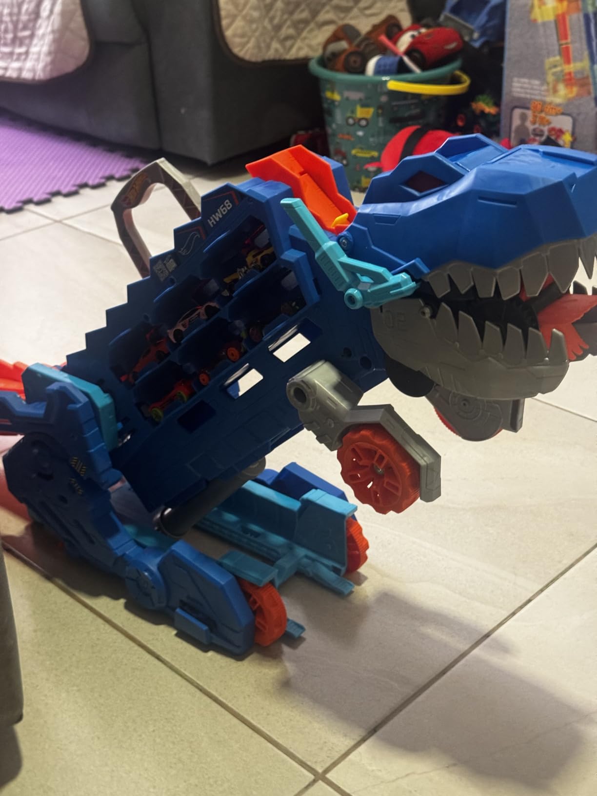 Hot Wheels City Toy Car Track Set, Ultimate T-Rex Transporter, Hauler Transforms into Stomping Dino with Race Track, from Netflix Series “Let’s Race” customer photo 1